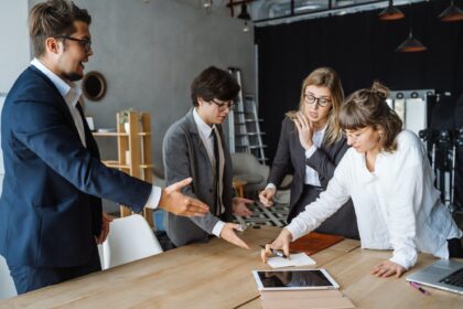 Business people having discussion, dispute or disagreement at meeting or negotiations